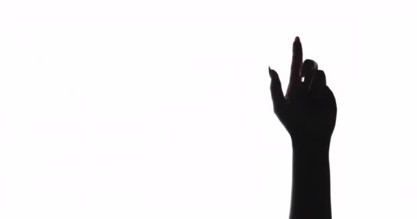 Hand silhouette female protest dark raised up fist — Stock Video