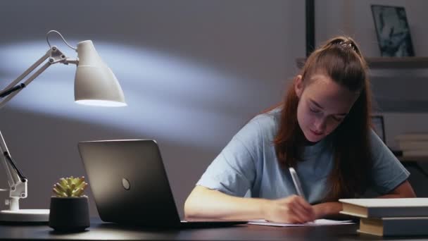 Night study creative block annoyed student writing — Stock Video