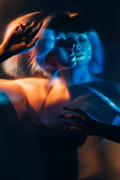 Psychedelic silhouette mysterious woman blue light — Stock Photo, Image