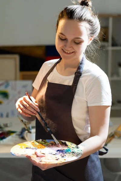 Enjoying art female artist painting school — Stock Photo, Image