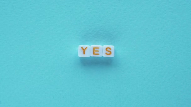 Yes sign approval text positive cubes word blue — Stock Video