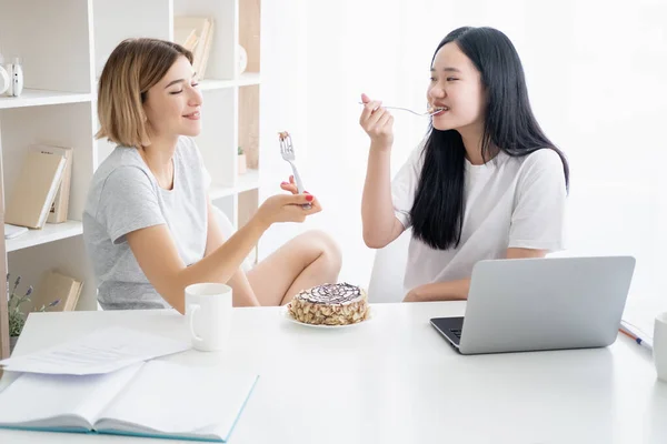 Home cheat meal happy female friends candy lover — Stock Photo, Image