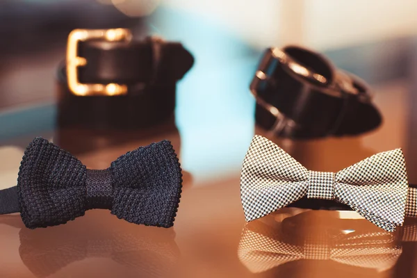 Bow tie and belt in shop — Stock Photo, Image