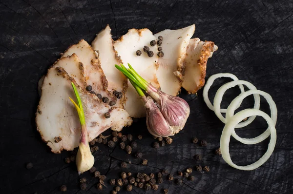 Bacon, garlic, slices of onions and black pepper — Stock Image Bacon, garlic, slices of onions and black pepper Stock Photo