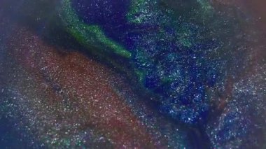 Boya serpintisi. Sıçrama dokusu. Odaklanmamış yeşil kırmızı renk parlak gökkuşağı parlatıcı sıvısı soyut canlı sanat arka planında.