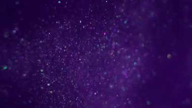 Sihirli buhar Sanat bulanıklığı parıltısı. Parıldayan karışım parlayan parçacıklar Bokeh kıvılcımlarında parlıyor. Mor mor boya akışı soyut arkaplan.