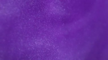 Parıltı dalgası. Mistik bulanık sıvı. Toz bulutu mürekkep emülsiyonu. Mor mor renk soyut scintilla arkaplan dokusunu parlatır.