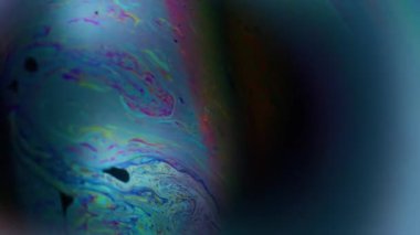 Odaklanamayan galaksi topu. Boya dökülmüş. Renk sıvısı parlayan küre. Kozmik dünya benzini Cyan soyut çerçeve arkaplanı.