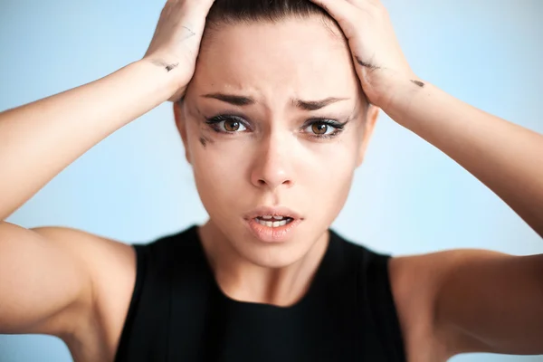 De vrouw met de verwende make-up — Stockfoto