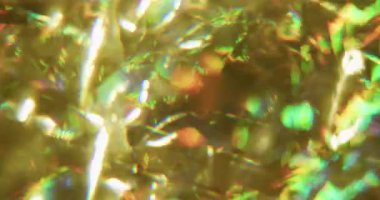 Görüntü disko sızıntısı. Dereceli yansıma. Cam prizmada Bokeh renkli ışıltı karışımı. Soyut sarı altın parlaklık parlaklık arka planı.