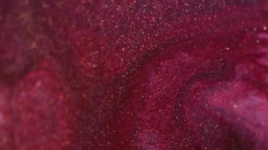 Köpüklü sıvı. Parlak mürekkep karışımı. Odaklanmamış kırmızı pembe renk parçacıkları dokusu karışık dalga soyut sanat arkaplanı.