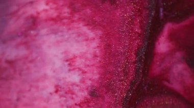 Parıltı dalgası. Köpüklü sıvı. Odaklanmamış pembe, pırıl pırıl parlayan desen çarpıcı, soyut sanat arkaplanı.