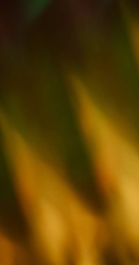 Defocused illumination overlay. Color night flare. Yellow orange striped wavy texture prism. Bright luminosity abstract vintage background.