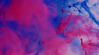 Boya buharı damlası. Mürekkep karışımı. Parlak sisli girdap dokusu bulanık su akıntısı. Kırmızı mavi pigment sis fantezi soyut arkaplan.