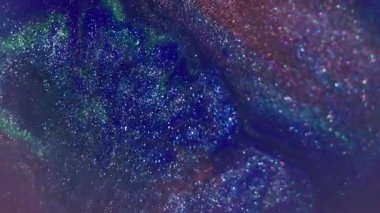 Boya serpintisi. Sıçrama dokusu. Odaklanmamış yeşil kırmızı renk parlak gökkuşağı parlatıcı sıvısı soyut canlı sanat arka planında.