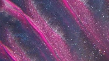 Parlak. Akış parçacıkları. Bulanık pembe, altın rengi dalga parlak sıvı soyut ışık, yaratıcı akrilik zemin üzerinde yüzüyor..