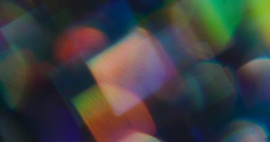 Görüntü pırıltısı. İşaret fişeği. Odaklanmamış turuncu neon renkli parlak yuvarlak parlak gökkuşağı yaratıcı aydınlatılmış sanat Bokeh soyutlaması.