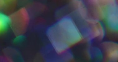 Bokeh geçmişi. İşaret fişeği. Odaklanmamış turuncu neon renkli parlak yuvarlak parlak gökkuşağı yaratıcı aydınlatılmış soyutlama üzerine.