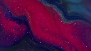 Bulanık akrilik sıvı. Parlak mürekkep. Odaklanmamış kırmızı, kırmızı, renkli su, parlak doku sıvısı soyut sanat arka planında akıyor..