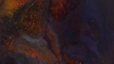 Parıldayan mürekkep. Parlak arka plan bulanık. Odaklanmamış turuncu, bronz, parlak su deseni, sanatın koyu siyah, yaratıcı soyutlaması..