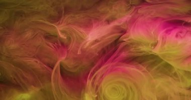 Buhar karışımı. Boya damlası. Suyun altında çözünmüş sarı pembe renk akrilik sıçrama bulutlu parlak doku soyut sanat arka planına yayılıyor.