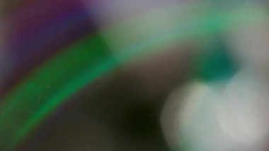 Spektrum parlaklığı dağıldı. İşaret fişeği. Kristal prizma aydınlatmasında kavisli halka parlaması. Soyut renkli ışıltılı sanat arkaplanı.