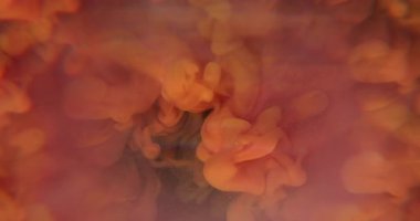 Bulanık duman boyası. Mürekkep akışı. Odaklanmamış turuncu pembe toz bulutu dokusu soyut sanat arka planına yayılan sıcak sıçrama gökkuşağı..