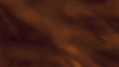 Odaklanamayan yansıma titreşimi. Güneş sızıntısı. Parlak soyut arkaplanda parlayan renkli ışık. Sanat parlaklığı turuncu folyo dokusu.