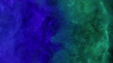Işıl ışıl dökülüyor. Parlak sıvı. Mavi yeşil turkuaz köpüklü bulut siyah arka planda karışıyor. Renk tozu mürekkebi soyut karışım bulanık su.