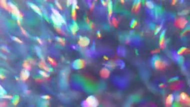 Odaklanamayan parıltı. İşaret fişeği. Soyut sanat arka planında mor turuncu neon renkli, gökkuşağı yuvarlak, görsel ışıltı..