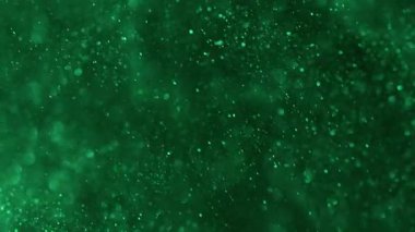 Bulanık daireler. Canlı parçacıklar. Soyut sanat arkaplanı üzerinde yüzen yeşil renkli parıltılı parlak parlak yuvarlak desen.