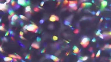 Bokeh yansıması. Neon ışığı. Mor turuncu sarı renkli mercek parlak gökkuşağı yuvarlak desen soyut parlak arkaplanda parlıyor.