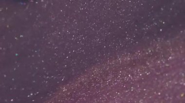 Mürekkep sıçraması. Parıldayan kabarcıklar. Odaklanmamış mor turuncu renk soyut sanat arka planında parlak yuvarlak yağ dokusu akrilik sıçraması.