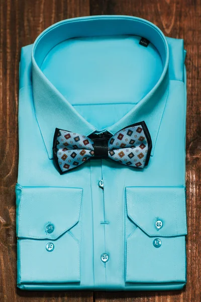 stylish  bright blue  men's shirt with  blue bowtie