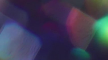 Görüntü pırıltısı. İşaret fişeği. Odaklanmamış turuncu neon renkli parlak yuvarlak parlak gökkuşağı yaratıcı aydınlatılmış sanat Bokeh soyutlaması.