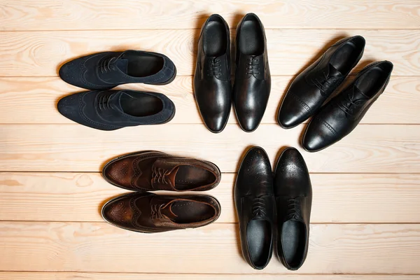 Several new pair of leather shoes — Stockfoto