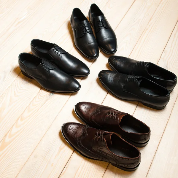 Several new pair of leather men's shoes — Stockfoto