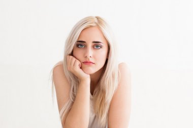 sad beautiful young blond woman bored