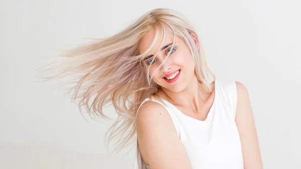 Woman with flying dyed hair — Stock Photo, Image