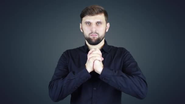 Man Shirt Dark Background Makes Hand Gestures — Stock Video