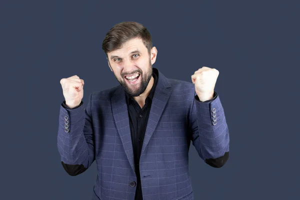 Man Beard Blue Suit Raised His Fists Air Showing Emotions — Stock Photo, Image