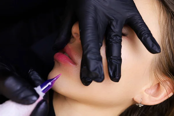 Master Permanent Makeup Holds His Lips His Fingers Performs Permanent — Stock Photo, Image