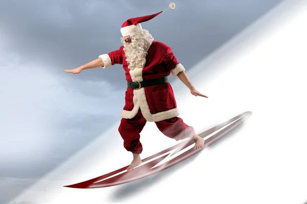 Sufing Santa — Stockfoto