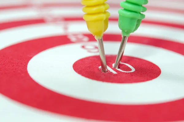 Dart arrows hitting in the target Stock Picture