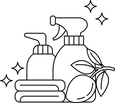 Üstünde yaprak olan bir sprey şişesi. Sprey şişe bir yığın havlunun yanında.