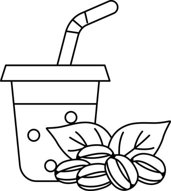 Üzerinde pipet ve kahve çekirdekleri olan bir fincan kahve. Görüntünün rahat ve rahat bir havası var.