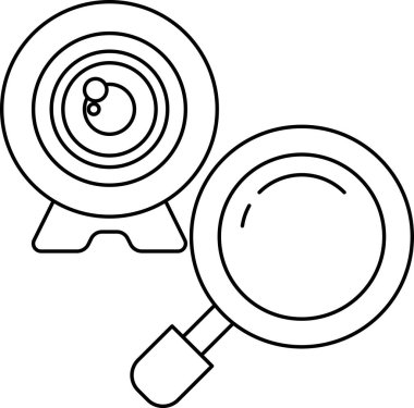 Bir kamera lensi ve büyüteç siyah beyaz çizilir. Kamera lensi merkezinde küçük bir delik olan bir dairedir, büyüteç ise merkezinde daha büyük bir delik olan bir dairedir.