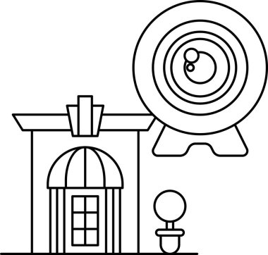 Üstünde bir kamera olan bir ev. Kamera siyah ve beyaz. Ev bir binanın önünde.