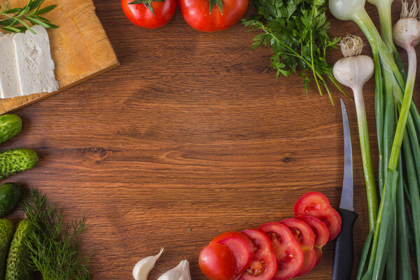 Vegetables on the table top with cheese 