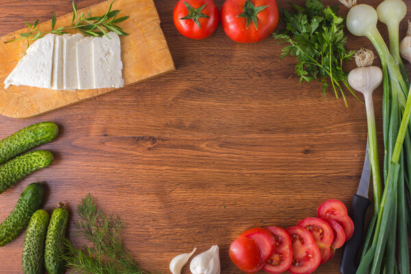 Vegetables on the table top with cheese 